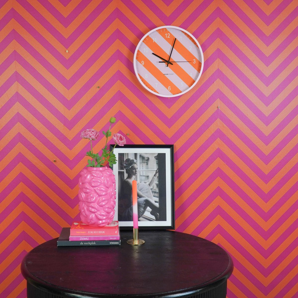 Wandklok met gestreept patroon - oranje/roze - 34x4x34cm